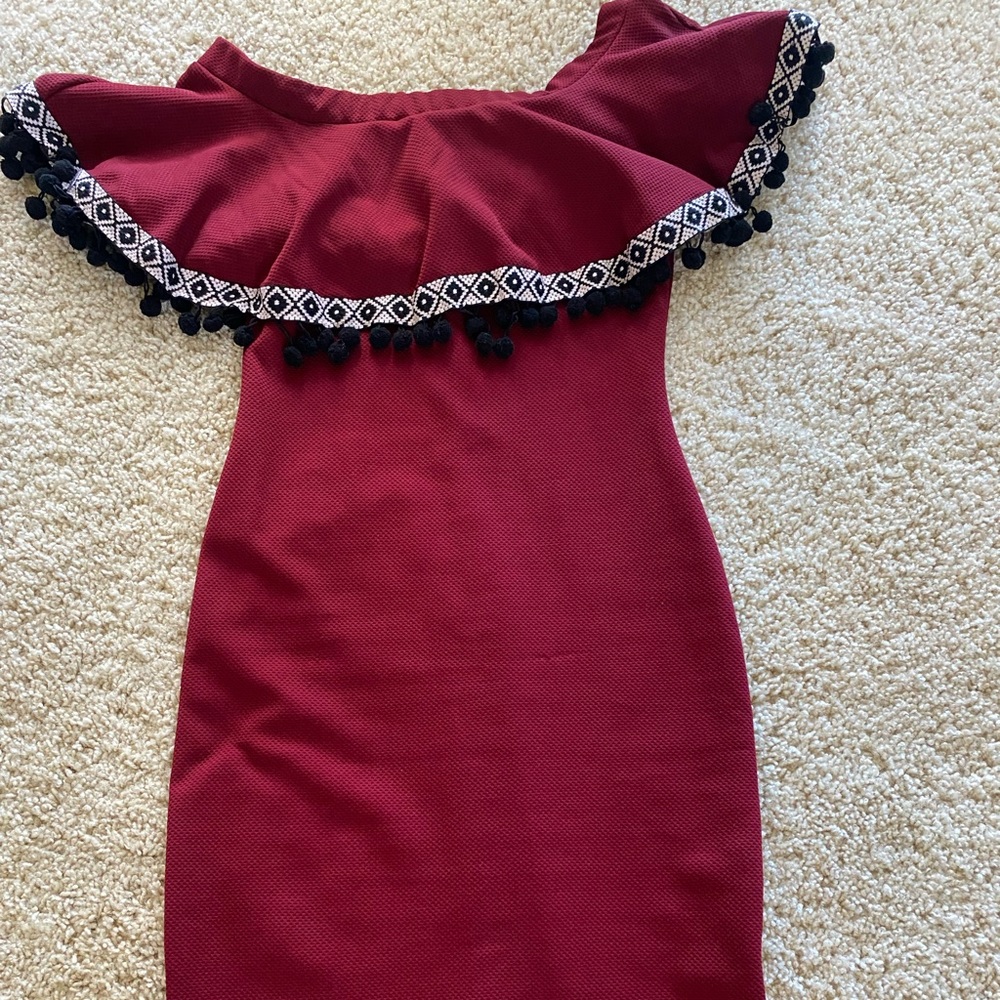 Maroon colored beautiful cotton dress .